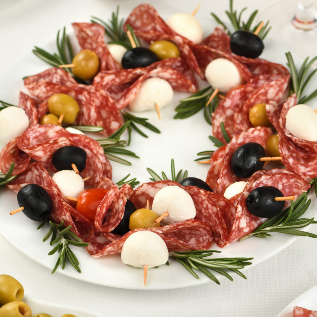 Antipasto salami skewers arranged in a wreath